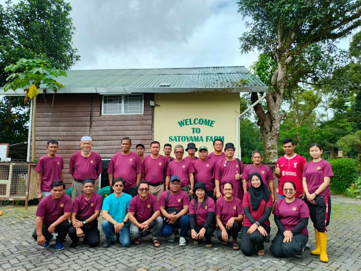 Participants joining a hands-on farm activity